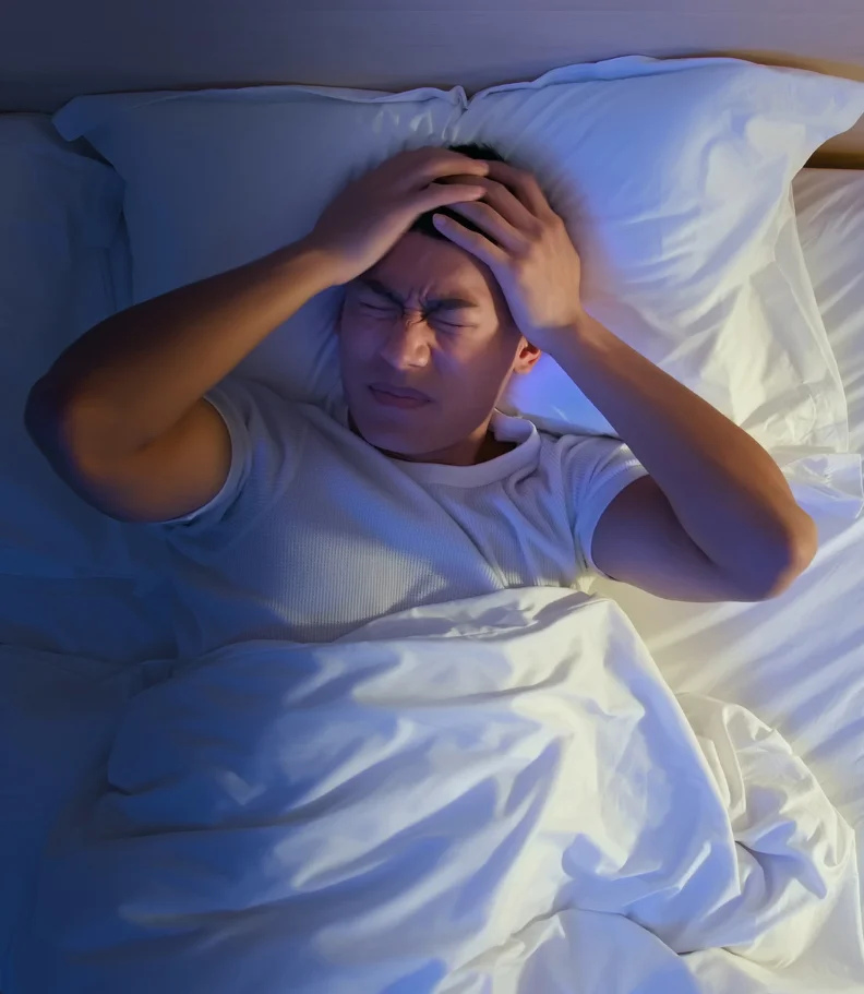 man experiencing headaches in Abidjan Côte d’Ivoire